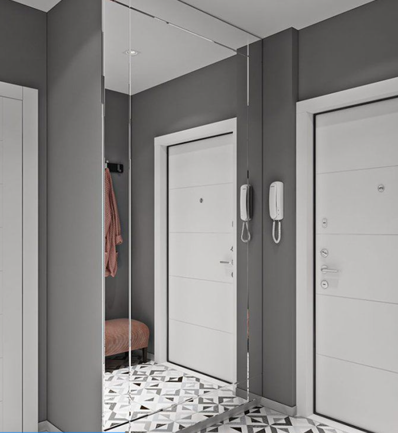 Белые двери в сочетании с серой палитрой интерьера: стильный дуэт.